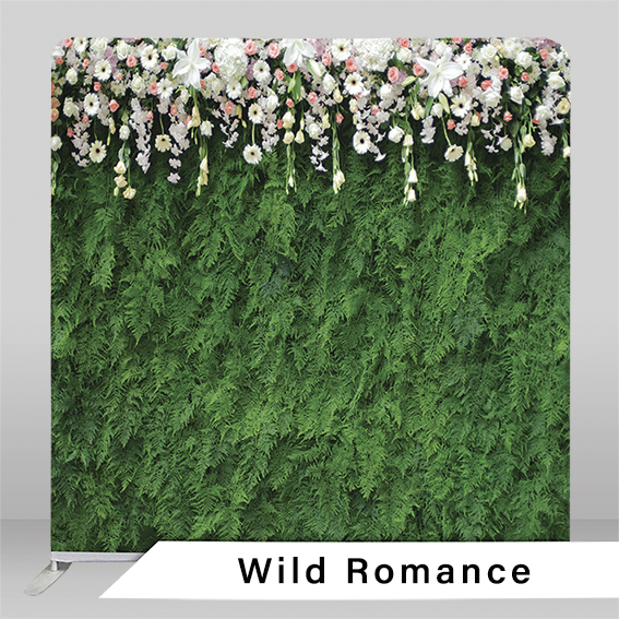 Calgary photo booth backdrop Wild Romance flowers spilling over a fern wall
